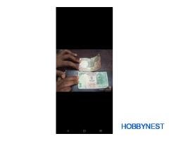 one rupe note and fierupes note