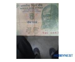 2 rupees ka note hai aur 5rupees ka tractor wala note hai